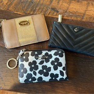Michael kors and Kate spade wallets. Price is for all 3